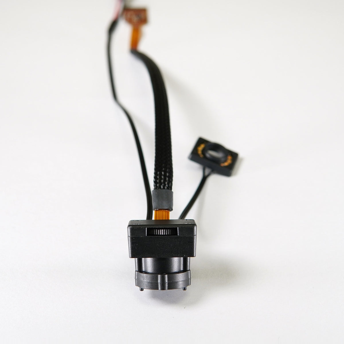 SMT Caddy Model A replacement camera module, close-up of the lens housing