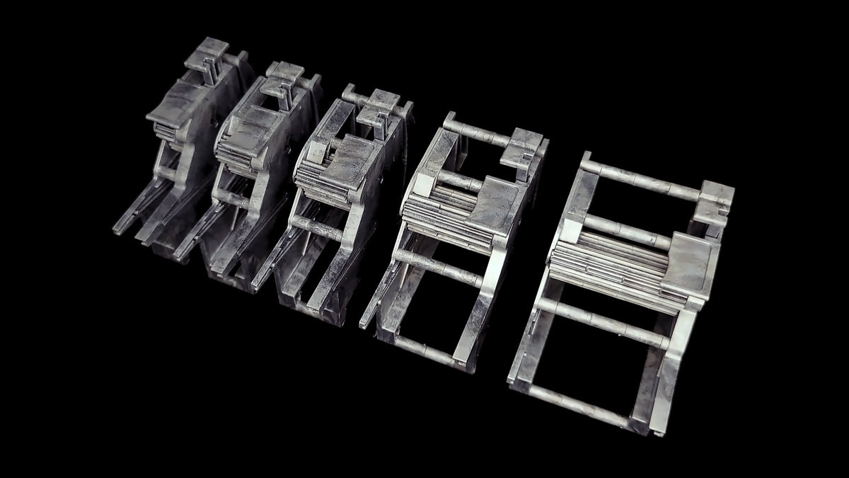 Five MTI tape feeders set for 8, 12, 16, 24 and 32 mm tape, left to right