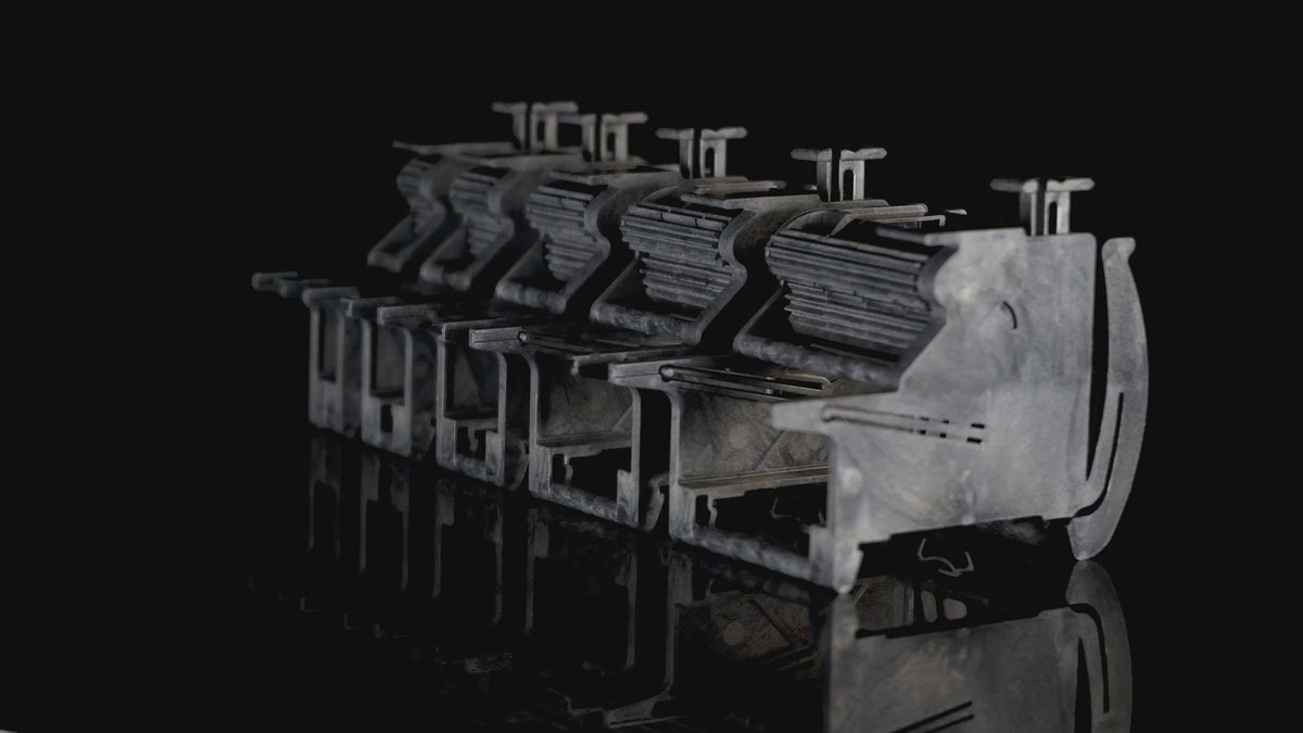 Five MTI tape feeders set for 8, 12, 16, 24 and 32 mm tape, seen from a slowly moving camera