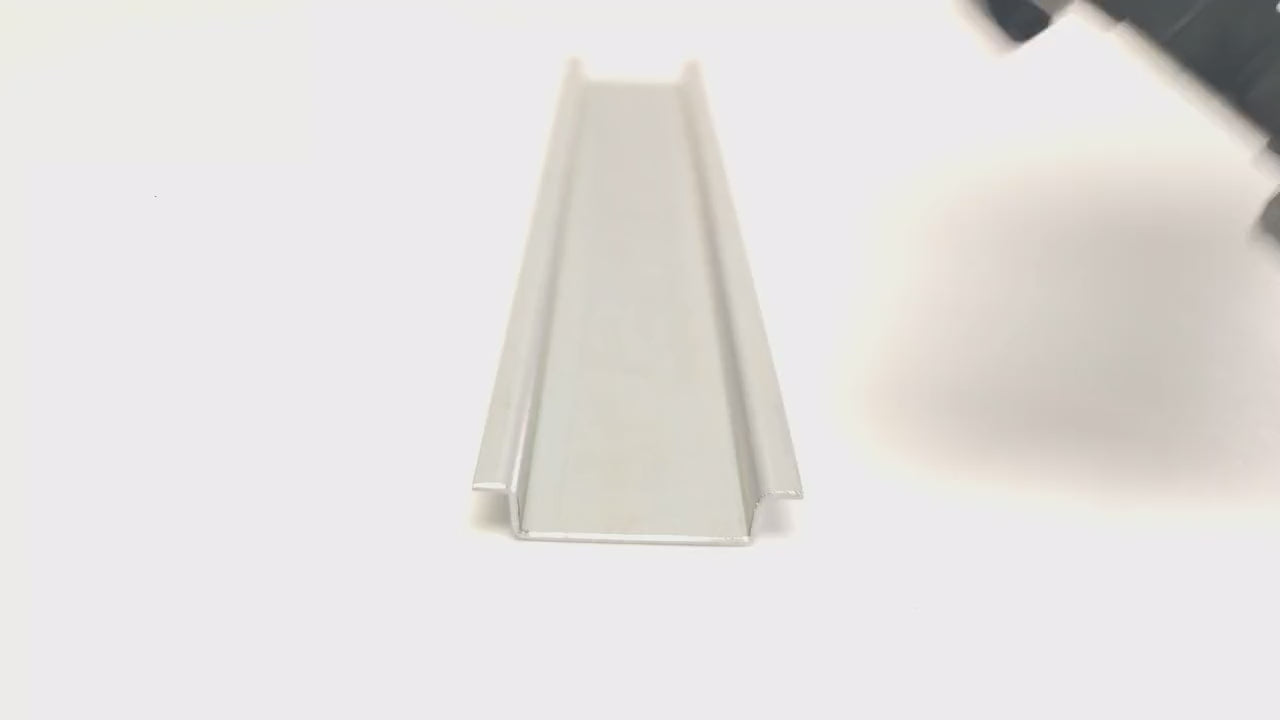 An MTI feeder clips onto 35 mm DIN rail and lifts off by hand