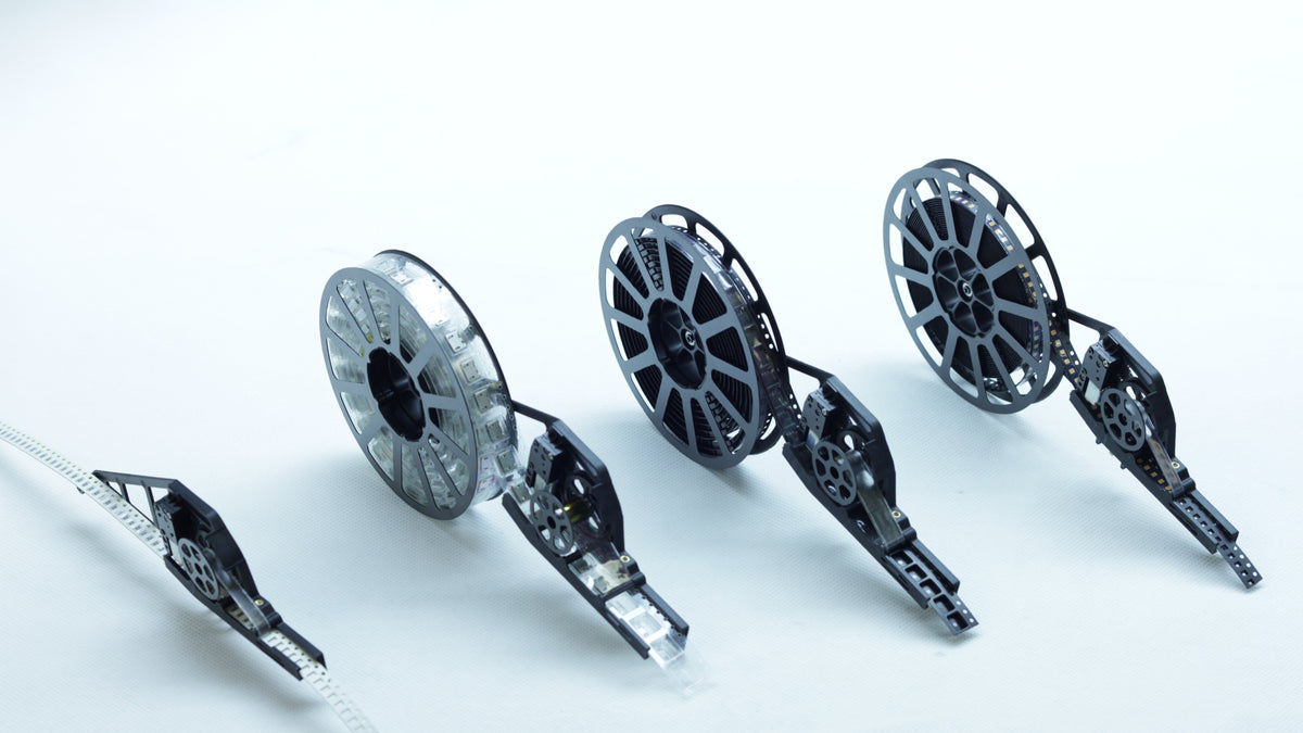 Model A tape feeders configured for different tape widths